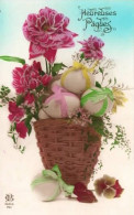 . HEUREUSES PÂQUES . Pagnier Fleuri Avec Des Oeufs Enrubannés  . - Ostern