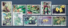 10 Timbres Taxes Oblitérés COMORES Fruits Fleurs Caméléon Papillon - Fruit