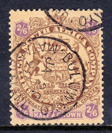 RHODESIA — SCOTT 35 — 1896 2/6- BROWN & VIOLET ON YELLOW ARMS — USED — SCV $65 - Northern Rhodesia (...-1963)