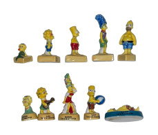 Série Complète De 10 Fèves Simpson En Vacances - Cartoni Animati