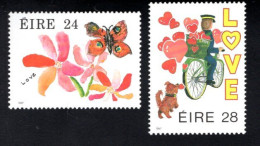 1999459130 1986  SCOTT 679 680 (XX) POSTFRIS  MINT NEVER HINGED - LOVE STAMPS - BUTTERFLY - DOG - FLOWERS - POSTMAN - Nuovi