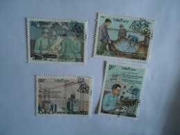 LAOS  4  USED STAMPS TECHNOLOGY 1990 - Otros & Sin Clasificación