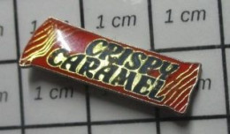 510A Pin's Pins / Beau Et Rare / ALIMENTATION / BARRE CHOCOLATEE CRISPY CARAMEL - Levensmiddelen