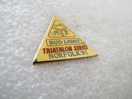 PIN'S      BUD LIGHT BIÈRE   TRIATHLON  NORFOLK    91 - Sonstige & Ohne Zuordnung