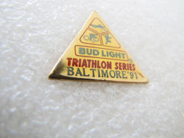 PIN'S      BUD LIGHT BIÈRE   TRIATHLON  BALTIMORE   91 - Sonstige & Ohne Zuordnung