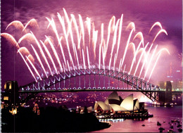 5-4-2024 (1 Z 10) Australia - Postcard Issued From Stamp Booklet - Sydney Harbour Bridge New Year Fire Work +Opera House - Ponts