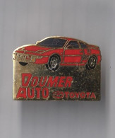 PIN'S   THEME AUTOMOBILE  TOYOTA  GARAGE  DOUMER A CHAMBOURCY  EN YVELINES - Toyota