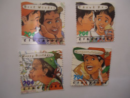 SINGAPORE  USED  STAMPS  SET 4  GREETING CHILDREN - Singapur (1959-...)