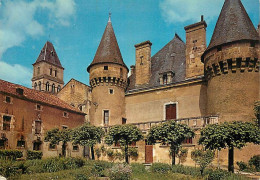 24 - Thiviers - Le Château De Vaucocour Masquant Une Partie De L'église - CPM - Voir Scans Recto-Verso - Thiviers