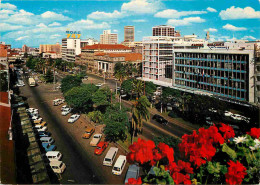 Kenya - Nairobi - Kenyatta Avenue - Automobiles - Immeubles - Fleurs - CPM - Voir Scans Recto-Verso - Kenya