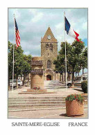 50 - Sainte Mère Eglise - Le Monument Américain Sur La Place De L'Eglise - Automobiles - Carte Neuve - CPM - Voir Scans  - Sainte Mère Eglise