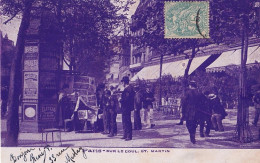 F4-75)  PARIS - SUR LE COUL ST MARTIN - MARCHAND DE JOURNAUX ET COLONNE MORRIS - ( ANIMEE ) - Arrondissement: 18