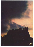 CPSM / CPM 10.5 X 15 Prestige CANTAL Coucher De Soleil Sur Des Ruines Au Sommet D'un Pic - Auvergne