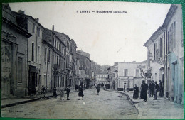 Cpa 34 LUNEL Animée BOULEVARD LAFAYETTE , 1915 , Commerces COIFFEUR REY LIBRAIRIE EDITEUR BARNEL - Lunel