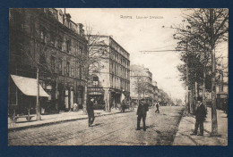 51. Reims. Laoner Strasse. Avenue De Laon (avant Guerre 1914-18). Magasins De Cycles, Lingerie, Buvette. Passants. - Reims