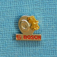 1 PIN'S /  ** PIÈCES AUTO " BOSCH " DISQUE ET ÉTRIER DE FREIN ** - Autres & Non Classés