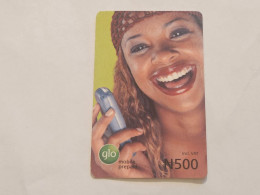 NIGERIA-(NG-GLO-REF-0003-071015)(26)Girl With Mobile Phone(Vertical)(23-3449-8287-3346)(500 Naria Nigri-5.1.07(send Card - Nigeria
