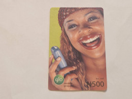 NIGERIA(NG-GLO-REF-0003-071018)(34)Girl With Mobile Phone(Vertical)(24-9874-4488-9532)(500 Naria Nigri-18.10.07send Card - Nigeria