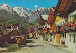 AK 212966 GERMANY - Garmisch-Partenkirchen - Frühlingstraße - Garmisch-Partenkirchen