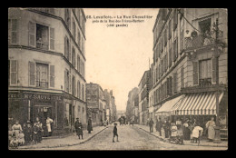 92 - LEVALLOIS-PERRET - LA RUE CHEVALLIER - VOIR ETAT - Levallois Perret