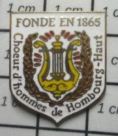 1618A  Pin's Pins / Beau Et Rare : MUSIQUE / FONDE EN 1865 CHOEUR D'HOMMES DE HOMBOURG HAUT CHORALE CHANT - Musica