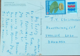 SWEDEN 1983, POSTCARD STOCKHOLM, USED TO DENMARK, VIGNETTE LABEL, RED CROSS, HAGERSTEN CITY CANCEL - Covers & Documents