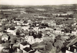 87 - LAURIERE _S28067_ L'Eglise Et Le Centre De La Ville - COMBIER - CPSM 15x10 Cm - Lauriere