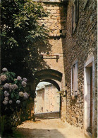 07 - Joyeuse - Vieille Porte Des Remparts Rue De Jales - Vieilles Pierres - Fleurs - CPM - Voir Scans Recto-Verso - Joyeuse