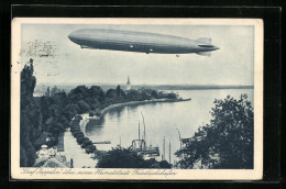 AK Friedrichshafen A. B., Luftschiff LZ127 Graf Zeppelin über Seiner Heimatstadt  - Zeppeline