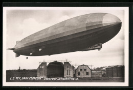 AK L. Z. 127 Graf Zeppelin, Luftschiff über Der Luftschiffhalle  - Luchtschepen