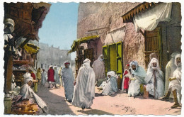 CPSM Dentelée  9 X 14 Algérie (7) Une Rue Du Vieux BISKRA  Les Commerces Les Hommes Dans Leur Djellabah - Biskra