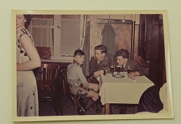 A Boy And Two Soldiers In A Pub - Anonymous Persons