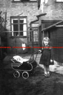 F006248 A Little Girl With A Stroller Is Standing By The House. 1940 - REPRODUCTION - Other & Unclassified