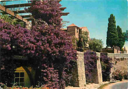 83 - Bormes Les Mimosas - Un Coin Pittoresque - Remparts - Fleurs - CPM - Voir Scans Recto-Verso - Bormes-les-Mimosas