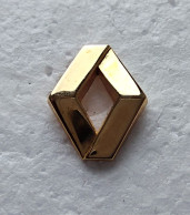 Pin's - RENAULT. Logo Doré - Renault