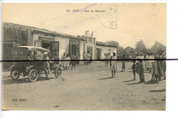 CPA . SOUDAN. KATI . Rue Du Marché . Voiture  . Soldats COLL MAHL - Soudan