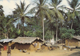 COTE D'IVOIRE. CPSM. .VILLAGE TYPIQUE. ANNEE 1991 + TEXTE + TIMBRE - Costa De Marfil