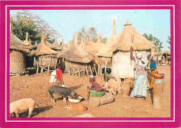 Mali - La Vie Au Village - Cases Indigènes Aux Environs Cfe Conakry - Cochons - CPM - Voir Scans Recto-Verso - Mali