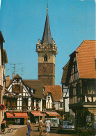 Automobiles - Obernai - La Rue SaInte-OdIle Et Le Kapellturm - CPM - Voir Scans Recto-Verso - Voitures De Tourisme