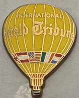 MONTGOLFIERE JAUNE - BALLON - BALLOON - BALLON - JOURNAL HERALD TRIBUNE INTERNATIONNAL - ZEITUNG - NEWSPAPER - AB - (34) - Montgolfières