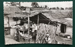 Douala, Petit Marchand Dans Le Village Indigene, Lib "Au Messager", N° 1548 - Kameroen