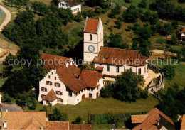 13864123 Oltingen BL Reformierte Kirche St Nikolaus Und Pfarrhaus Fliegeraufnahm - Autres & Non Classés