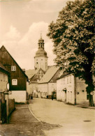 73890712 Geising Erzgebirge Ortspartie Mit Kirche Geising Erzgebirge - Geising