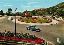 Automobiles - Digne Les Bains - Le Rond-Point à L'entrée Du Boulevard Gassendi - Fleurs - Carte Neuve - CPM - Voir Scans - Voitures De Tourisme