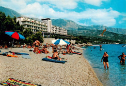 73886267 Tucepi Makarska Croatia Strandpartie  - Croatie