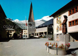 13789842 Saas-Fee VS Dorfplatz Und Kirche Allalin Und Alphubel  - Autres & Non Classés