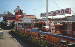 72253220 California_City Fun Train Big Santa And Giant Snowman In Background - Other & Unclassified