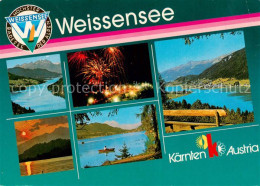 73855476 Weissensee Kaernten AT Teilansichten Feuerwerk Sonnenuntergang  - Weissensee