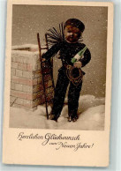 39746705 - Puppe Als Schornsteinfeger Mit Einer Flasche Sekt Im Schneegestoeber - New Year