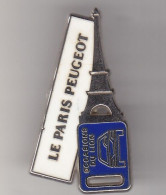 Pin's En Forme De Clef Le Paris  Peugeot Occasion Du  Lion Réf 5733JL - Peugeot